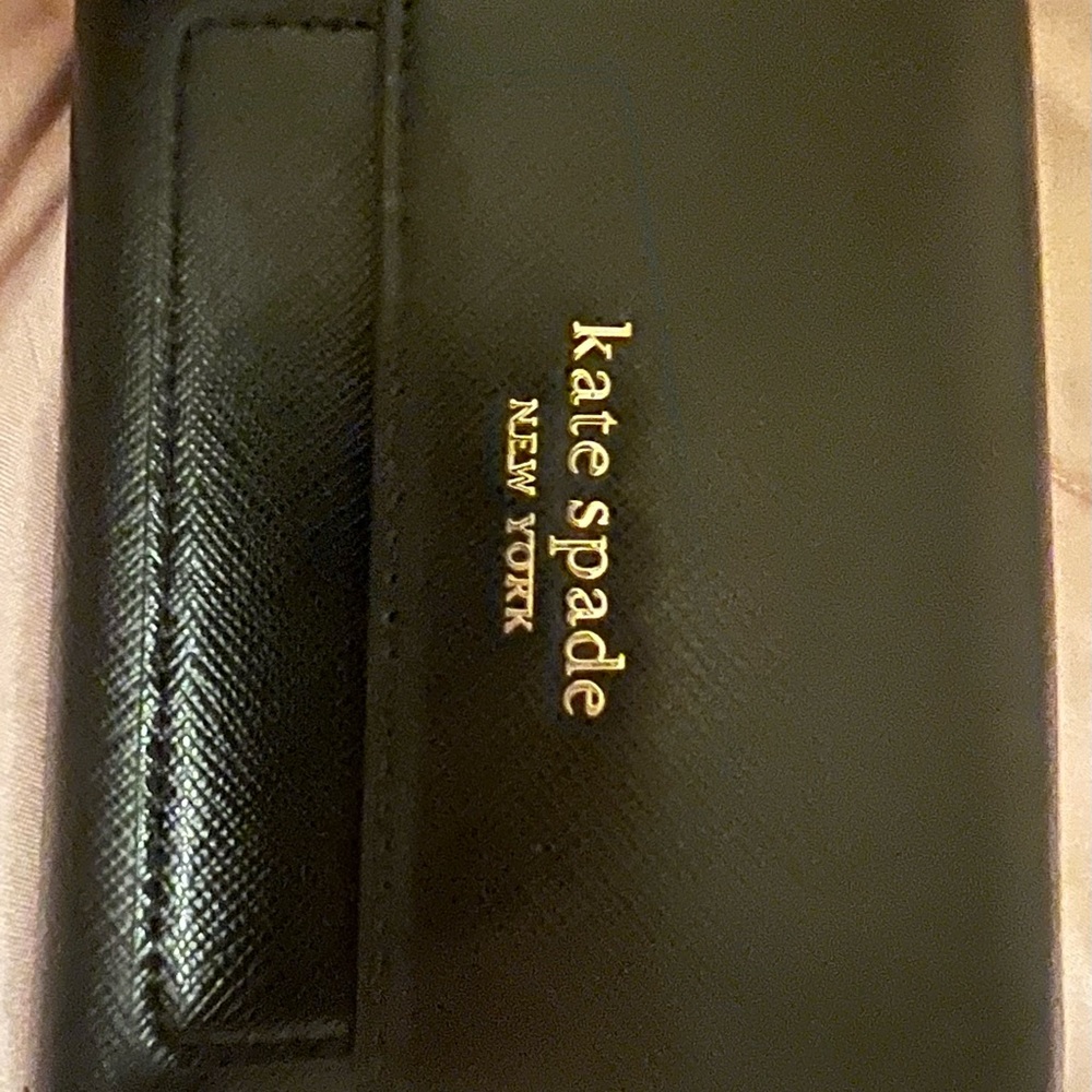 Kate Spade booked trifold flap wallet